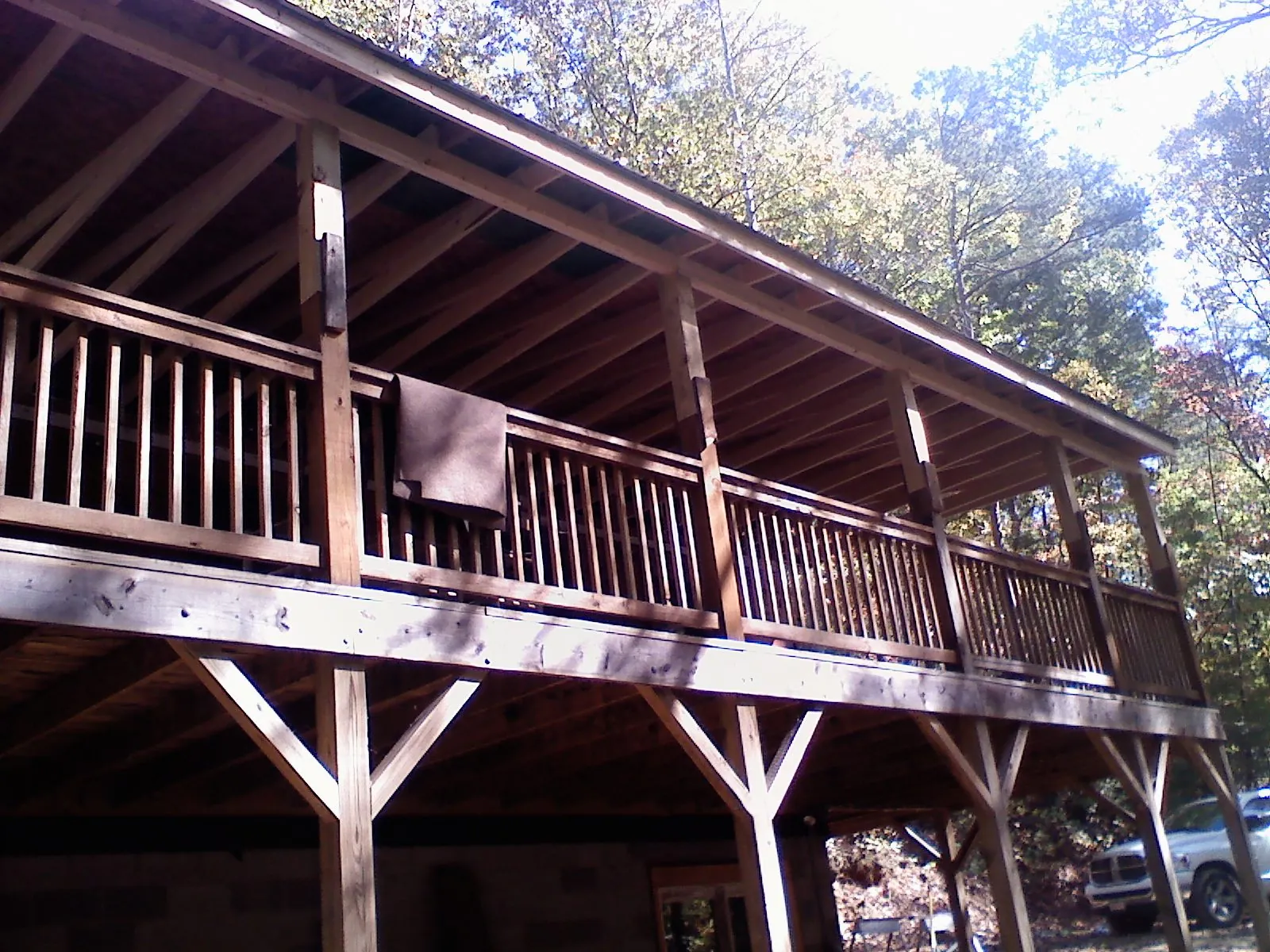 Timber framing under a new elevated porch and deck — Roof Leak Repair in South Salem by Roofing Brothers